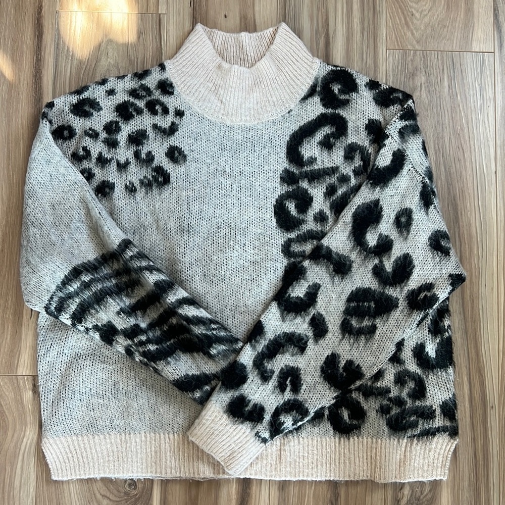 Black and beige sweater
